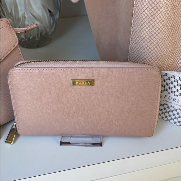 Furla Handbags - Like new Furla Blush Pink Long Ziparound Wallet